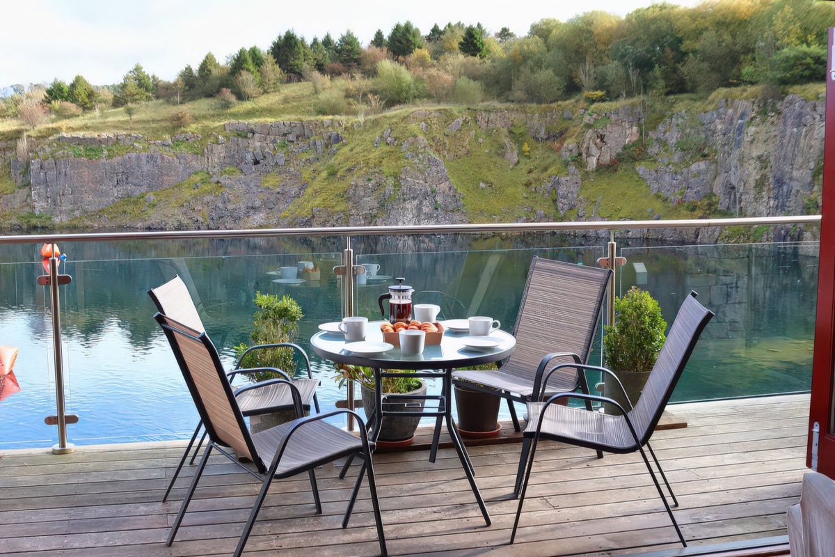 Boavista balcony dining table overlooking the lake