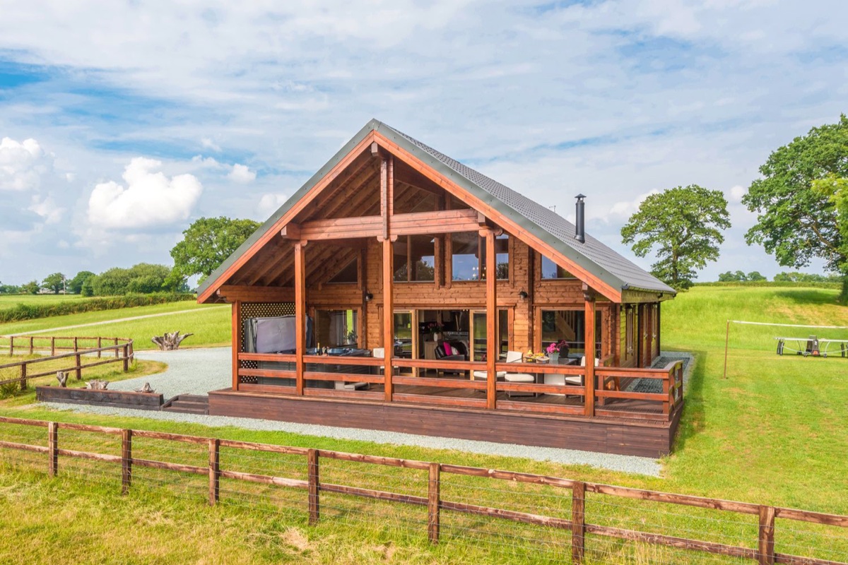 Hampton Lodge timber exterior with deck and open countryside around it