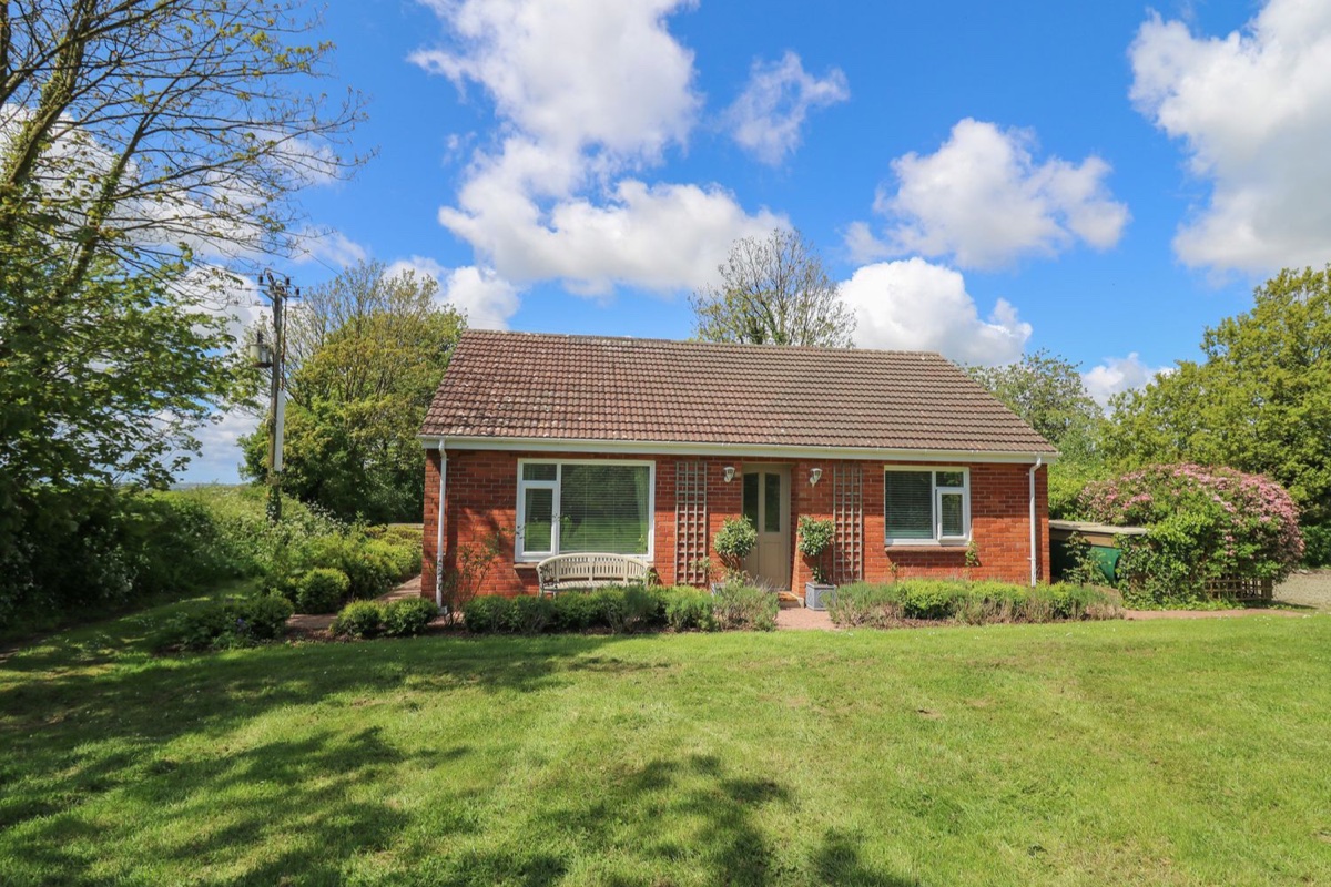 Lavender Lodge red-brick bungalow set on a private lawn near Haverfordwest