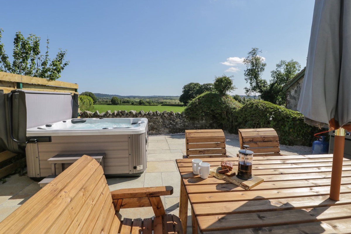 Ty Mawr Farm hot tub patio with countryside views